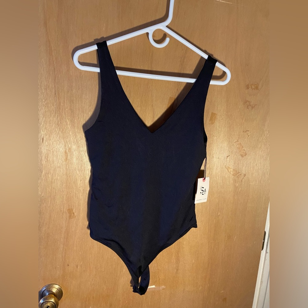 NWT deep v bodysuit